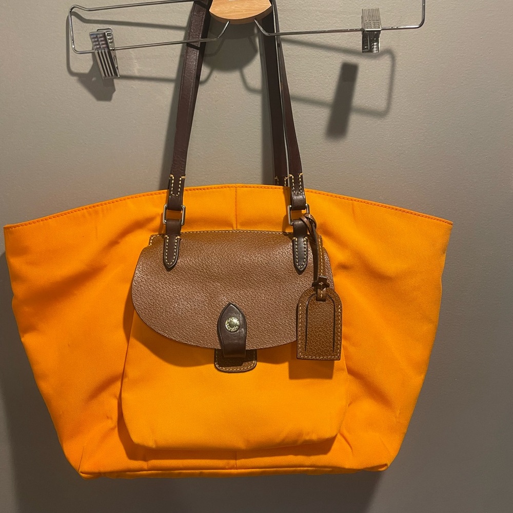 Dooney & Bourke orange leather canvas tote Hot pink liner